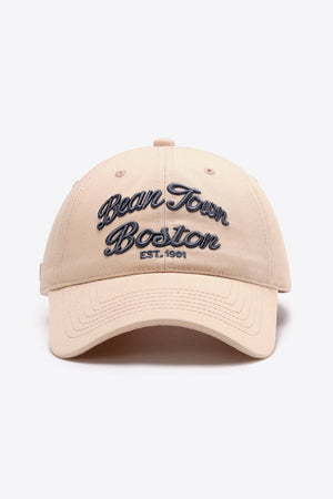 Tan baseball cap with embroidered "Bean Town Boston EST. 1901" text.