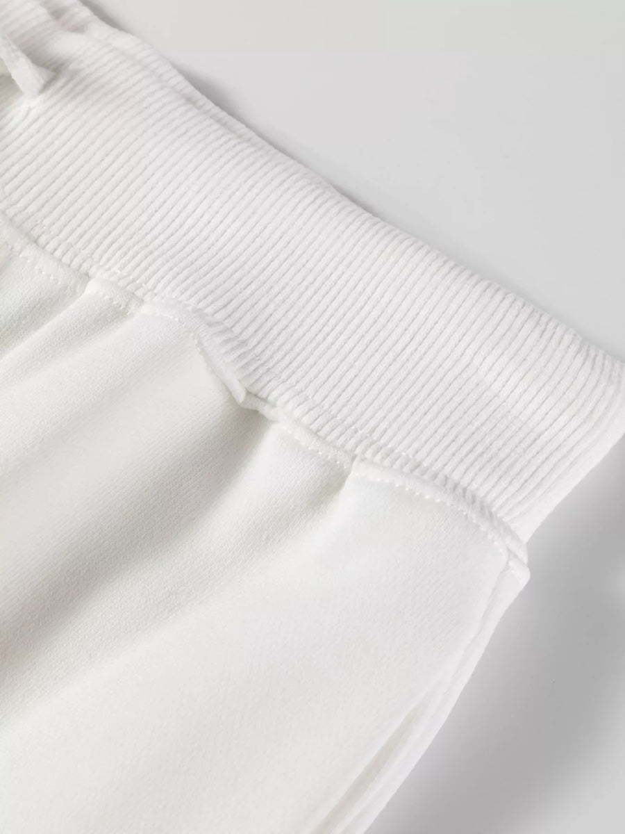 White drawstring loungewear pants with ribbed waistband detail
