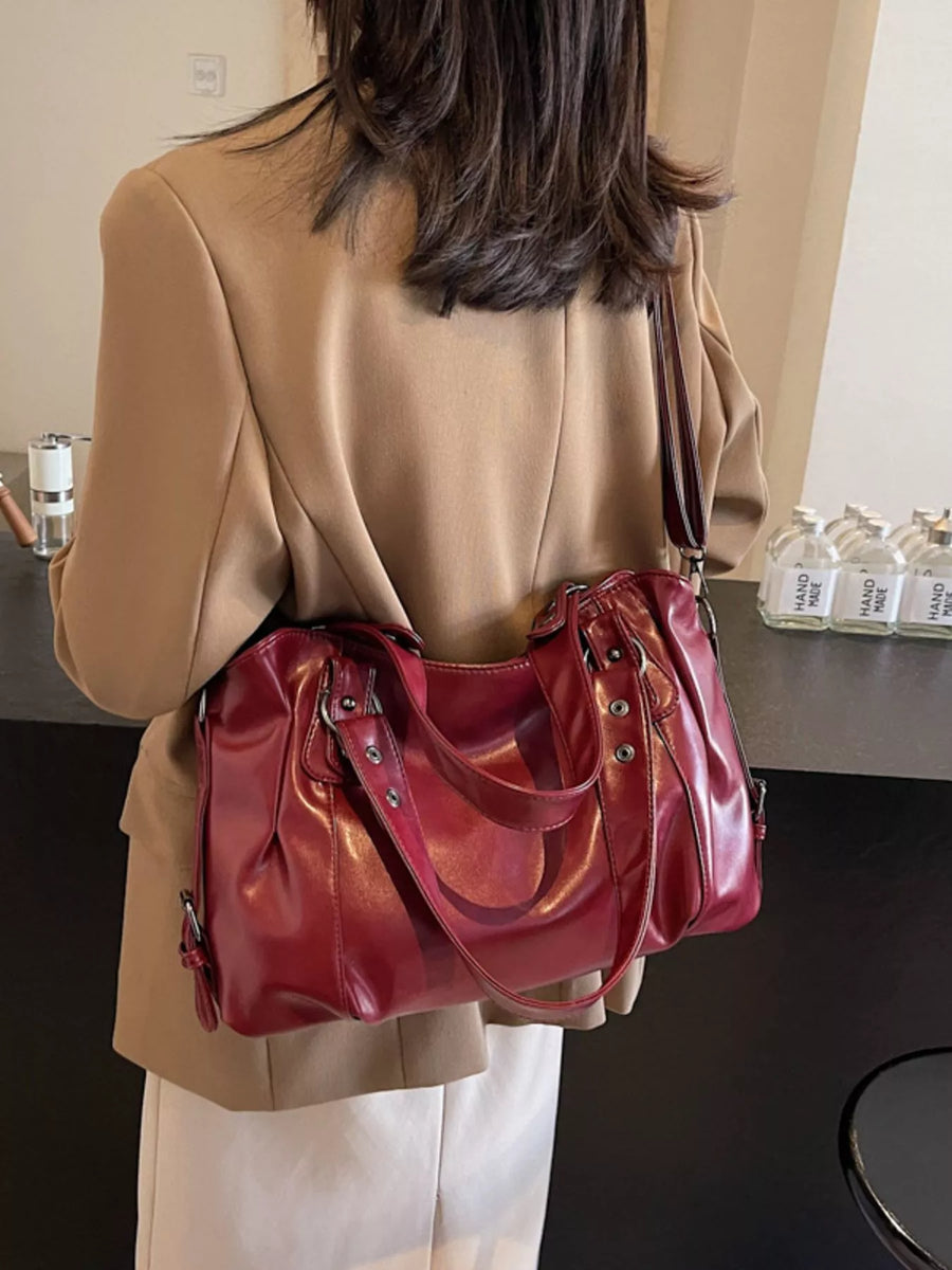 Large vintage PU leather shoulder bag in wine red with double handles and silver hardware.