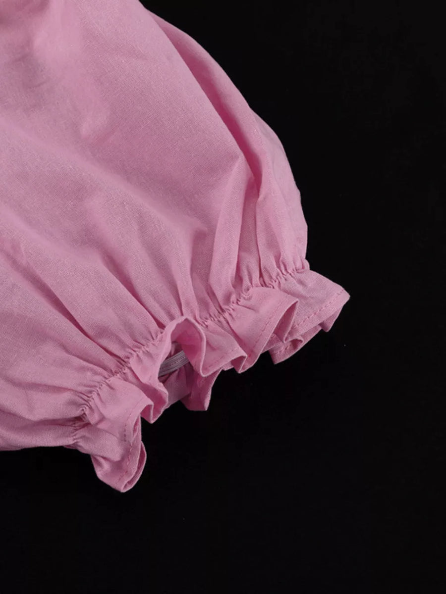 Pink linen puff sleeve with ruffled hem