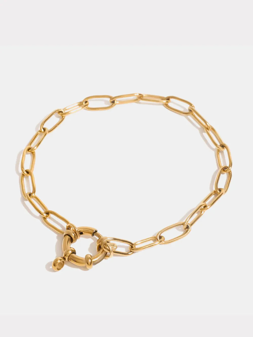 Gold chunky link bracelet with circular clasp