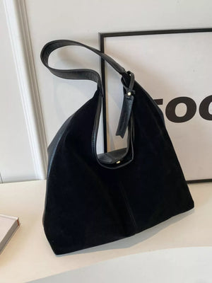 Black plush corduroy hobo shoulder bag with leather strap detail