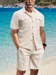 Textured resort shirt and shorts set in beige with button details and drawstring waist.