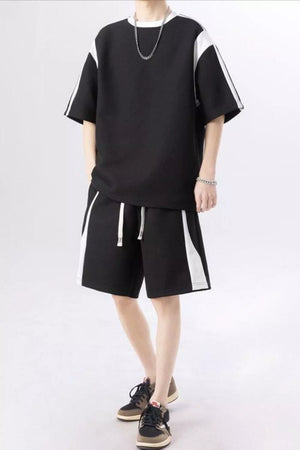 Black and white striped t-shirt and shorts set for men, casual athletic style.