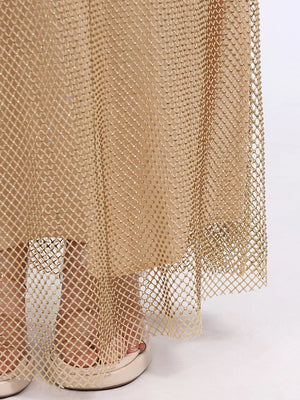 Gold mesh dress with rhinestone embellishments and a sheer hem.