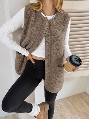 Dark Green vest with patch pockets and sleeveless