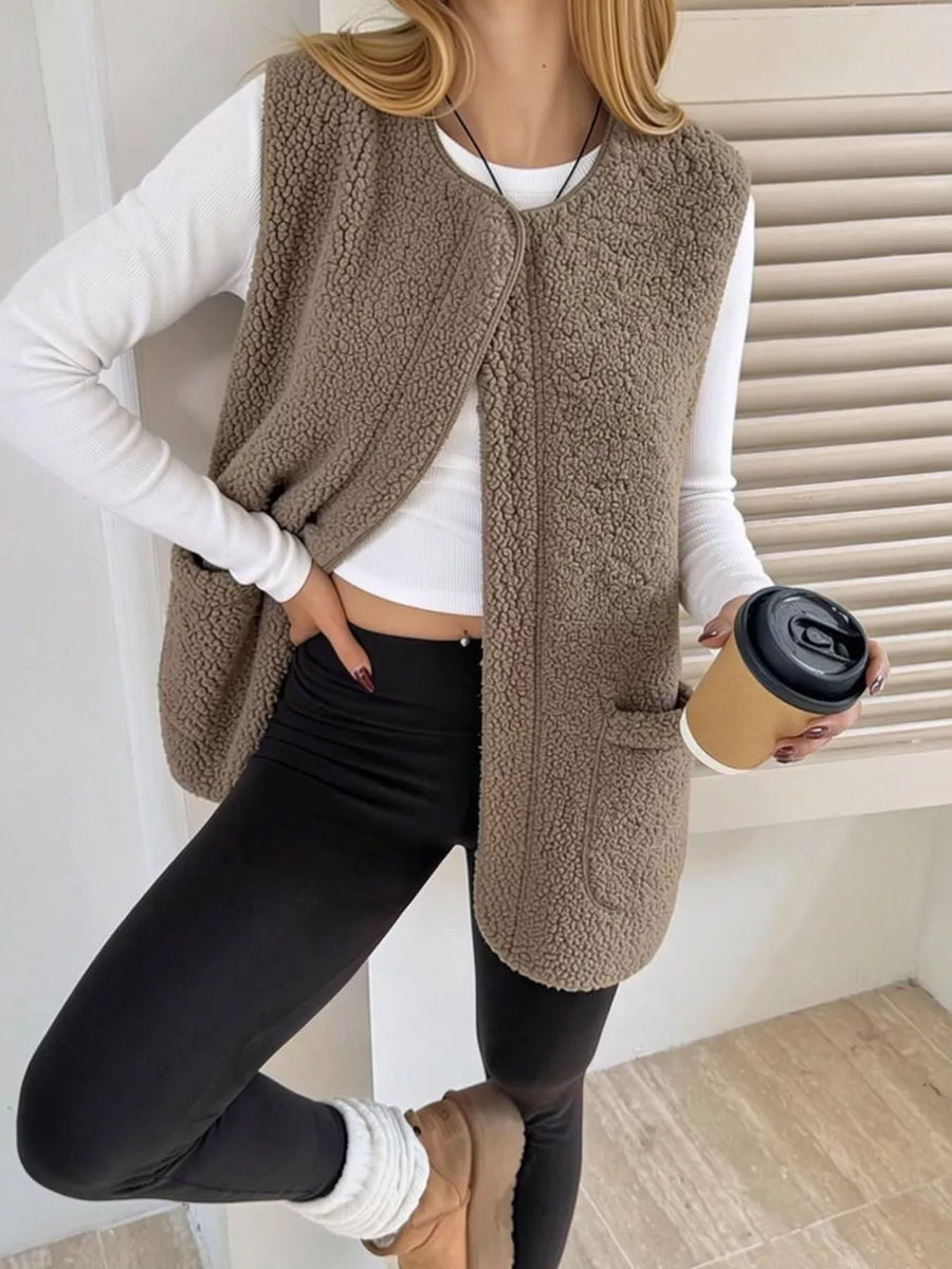 Dark Green vest with patch pockets and sleeveless