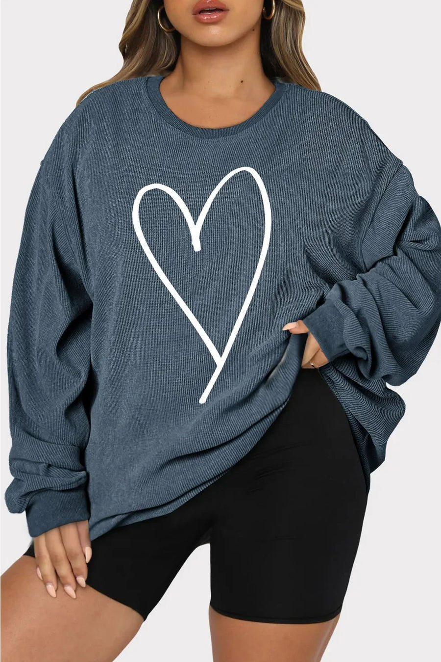 Ribbed crewneck sweatshirt in Deep Teal with white heart outline detail.