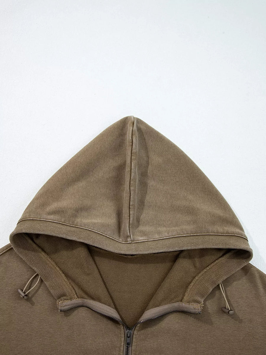Mineral wash coffee brown hooded sweatshirt with half zip and drawstring details.