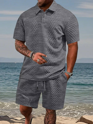 Gray textured knit polo shirt and drawstring shorts set for men.