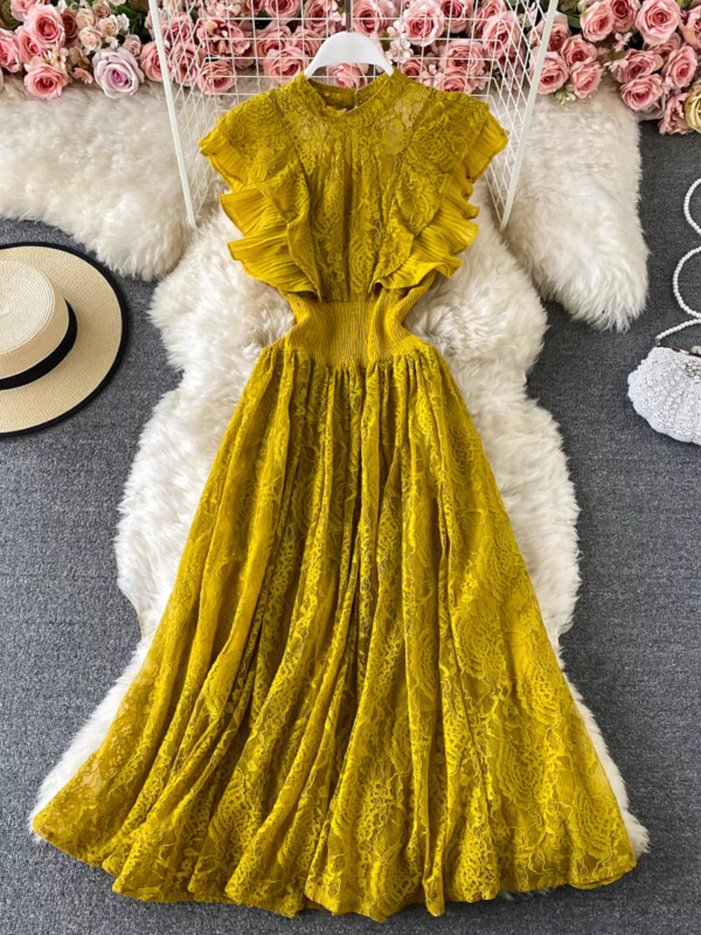 Yellow lace maxi dress with ruffled sleeves and cutout waist