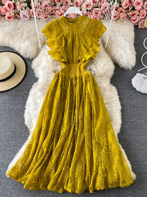 Yellow lace maxi dress with ruffled sleeves and cutout waist