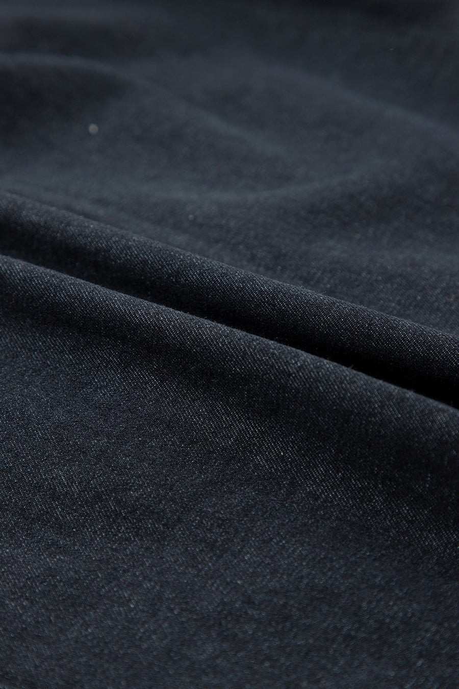 Black denim button-up shirt with frayed ruffle trim detail