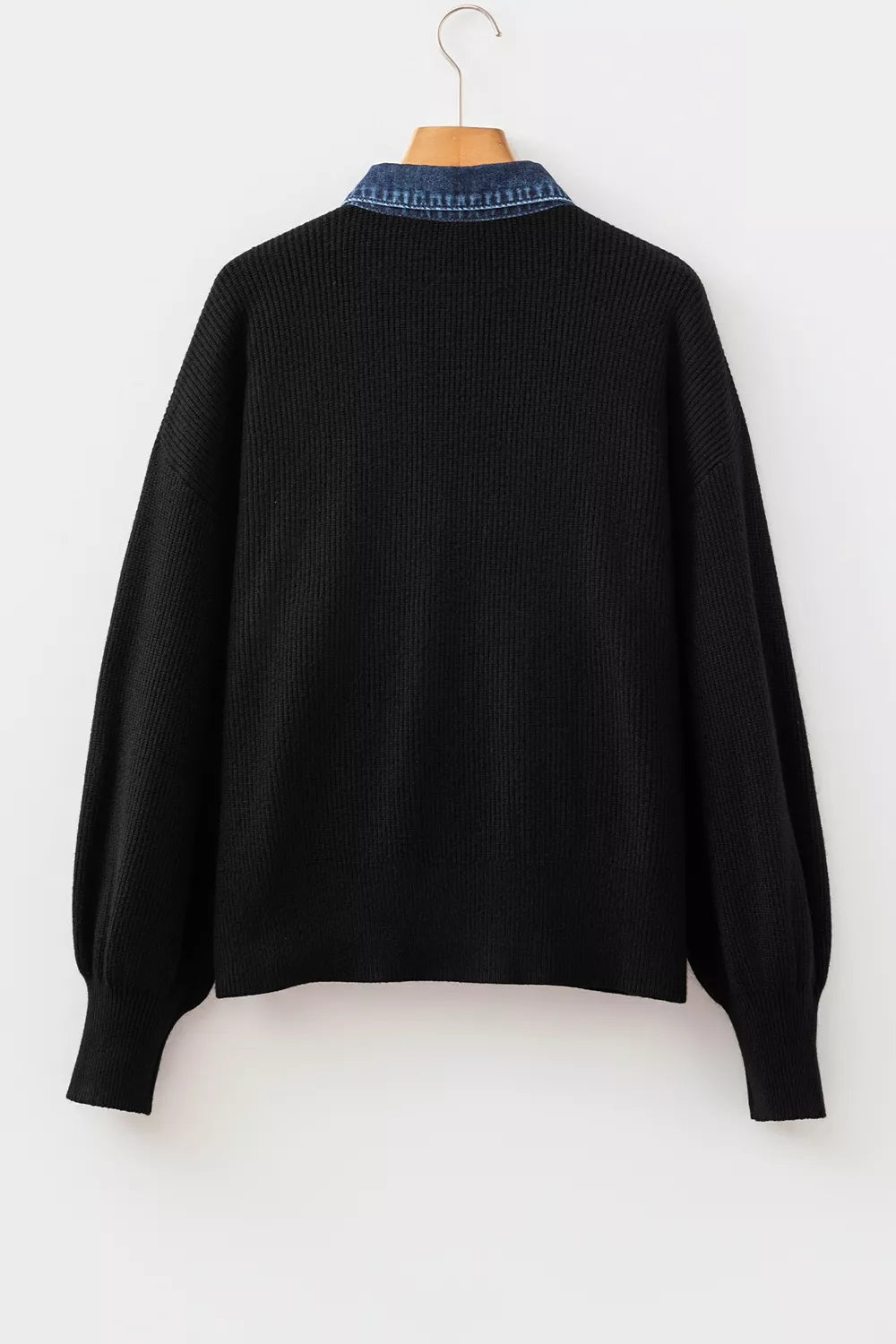 black cardigan with hip-length and button-front