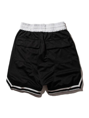 Black mesh basketball shorts with white drawstring and striped trim.