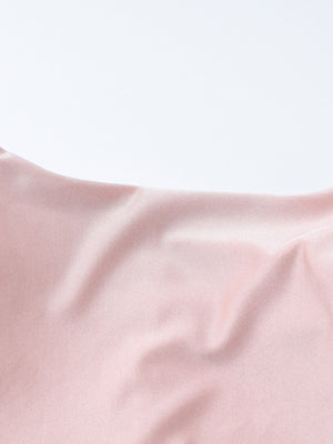 Pink ruched knot front maxi dress detail showing fabric texture and drape