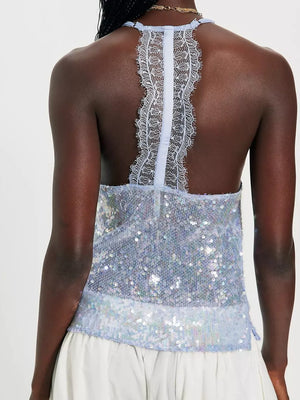 Blue sequin halter cami with white lace trim detail on back and hem.