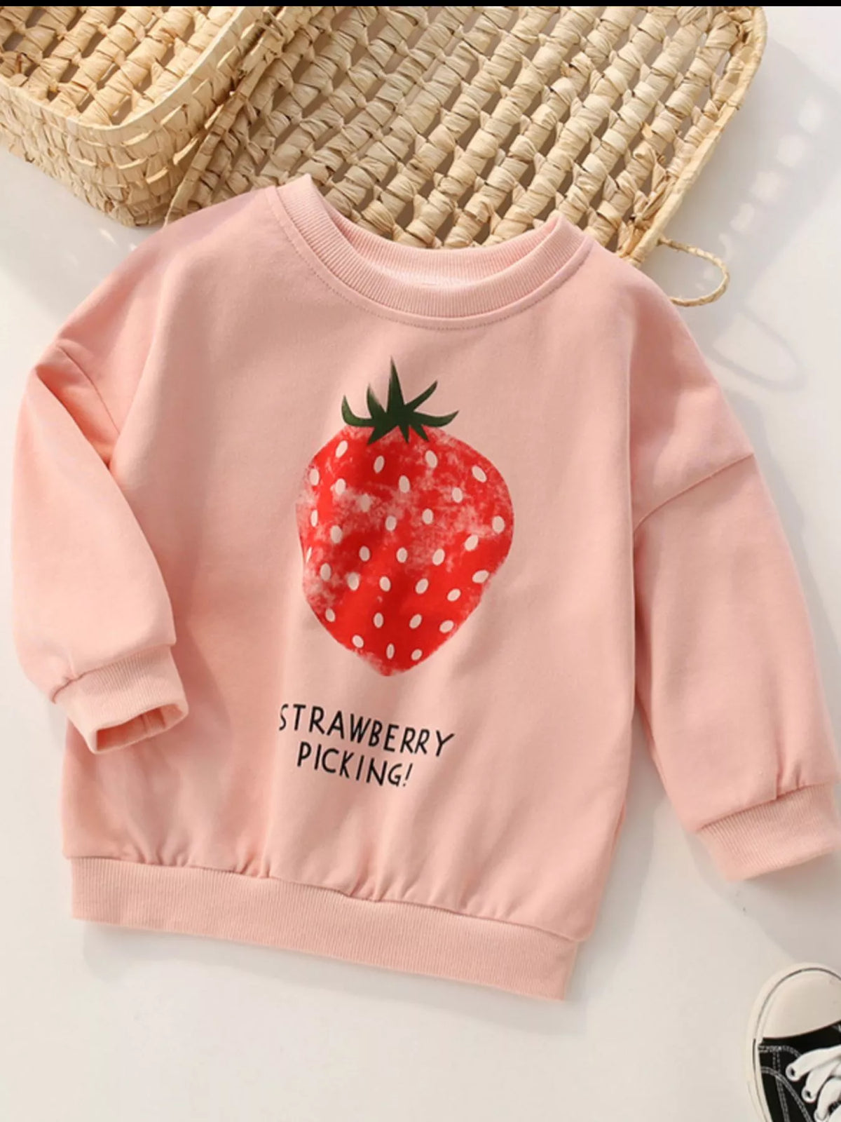 Kids' watermelon pink cotton sweatshirt with strawberry graphic and text.