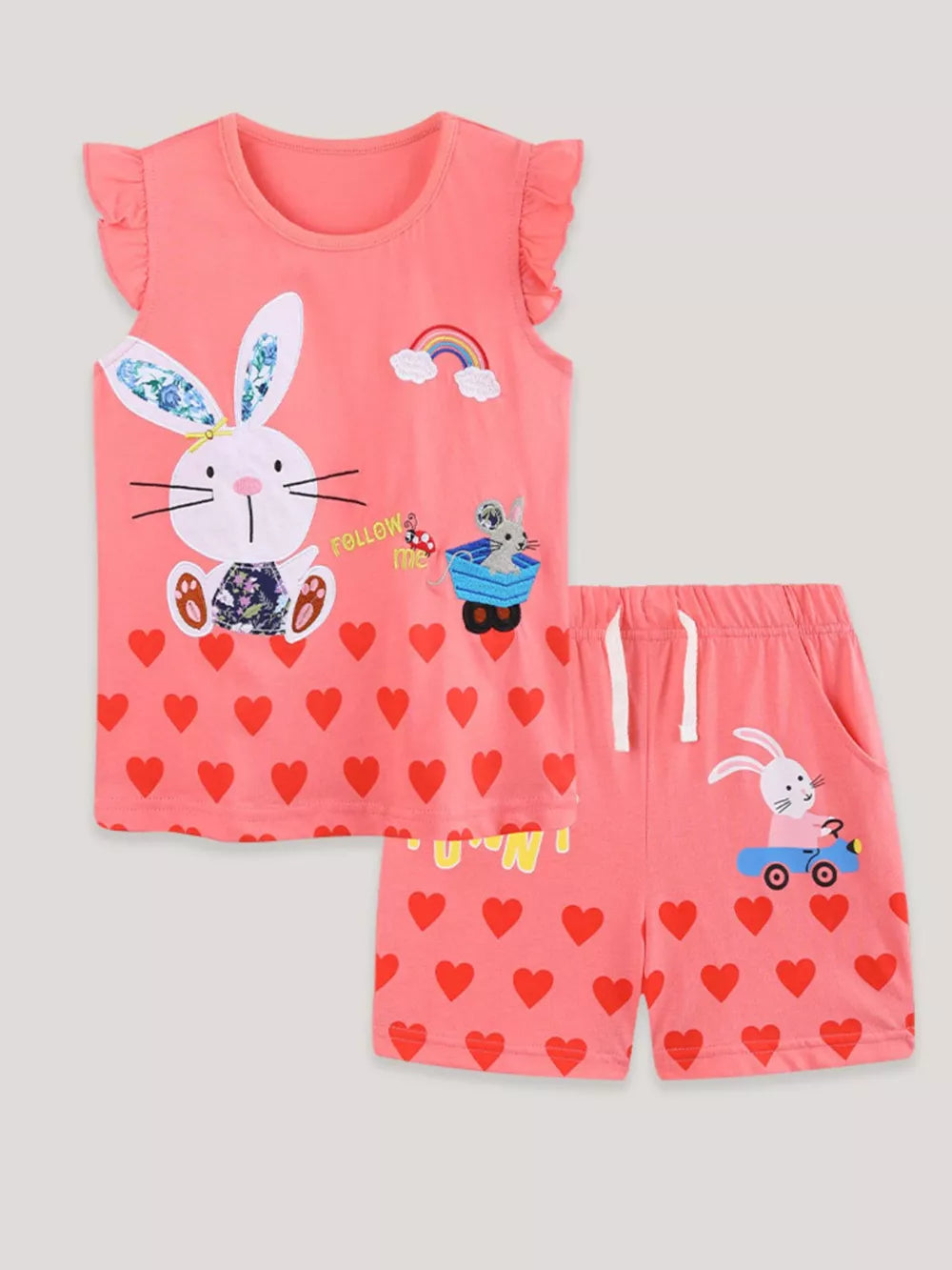Coral cotton toddler set with bunny heart print, rainbow, and ruffled sleeves.