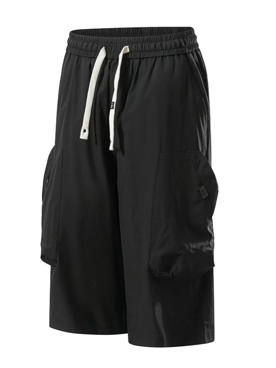 Black cargo capris with adjustable drawstring and large side pockets.