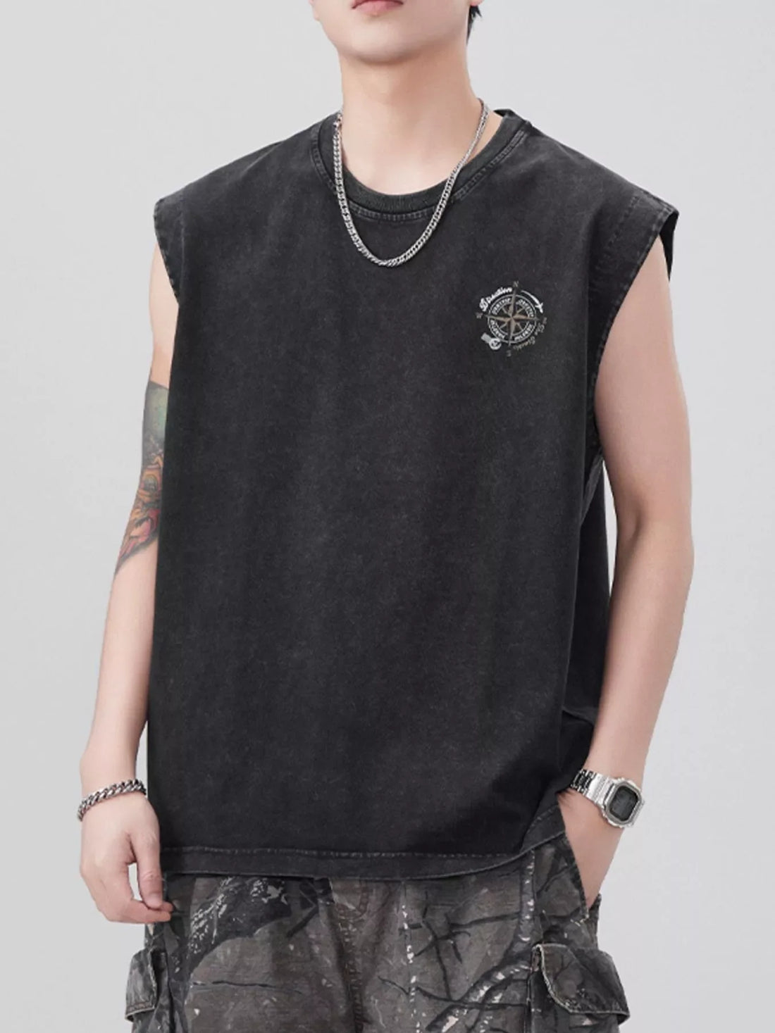 Oversized black cotton tank top with round neck and compass graphic detail