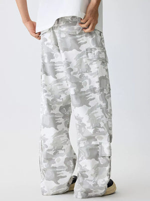 Relaxed fit cargo pants in snow camouflage with multiple pockets.