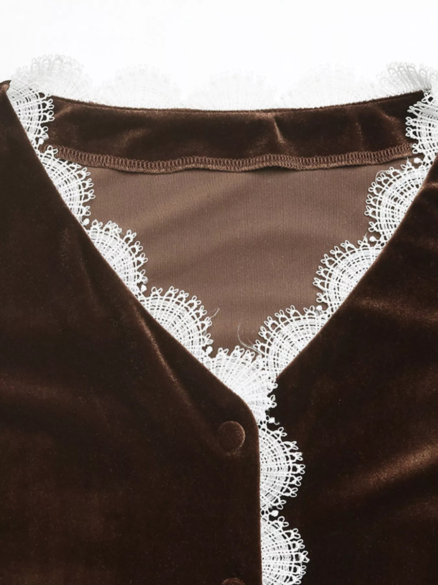 Brown velvet V-neck blouse with white lace trim and button detail.