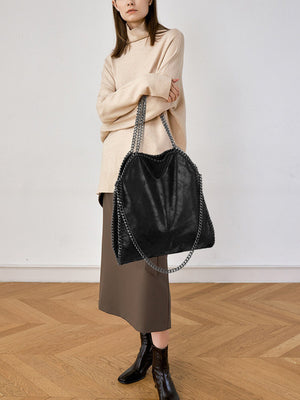 PU Leather Imported Size &amp handbag in Black with relaxed silhouette