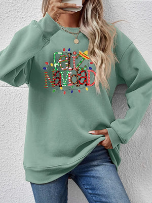 Sage green raglan sweatshirt with Feliz Navidad graphic and Christmas lights.