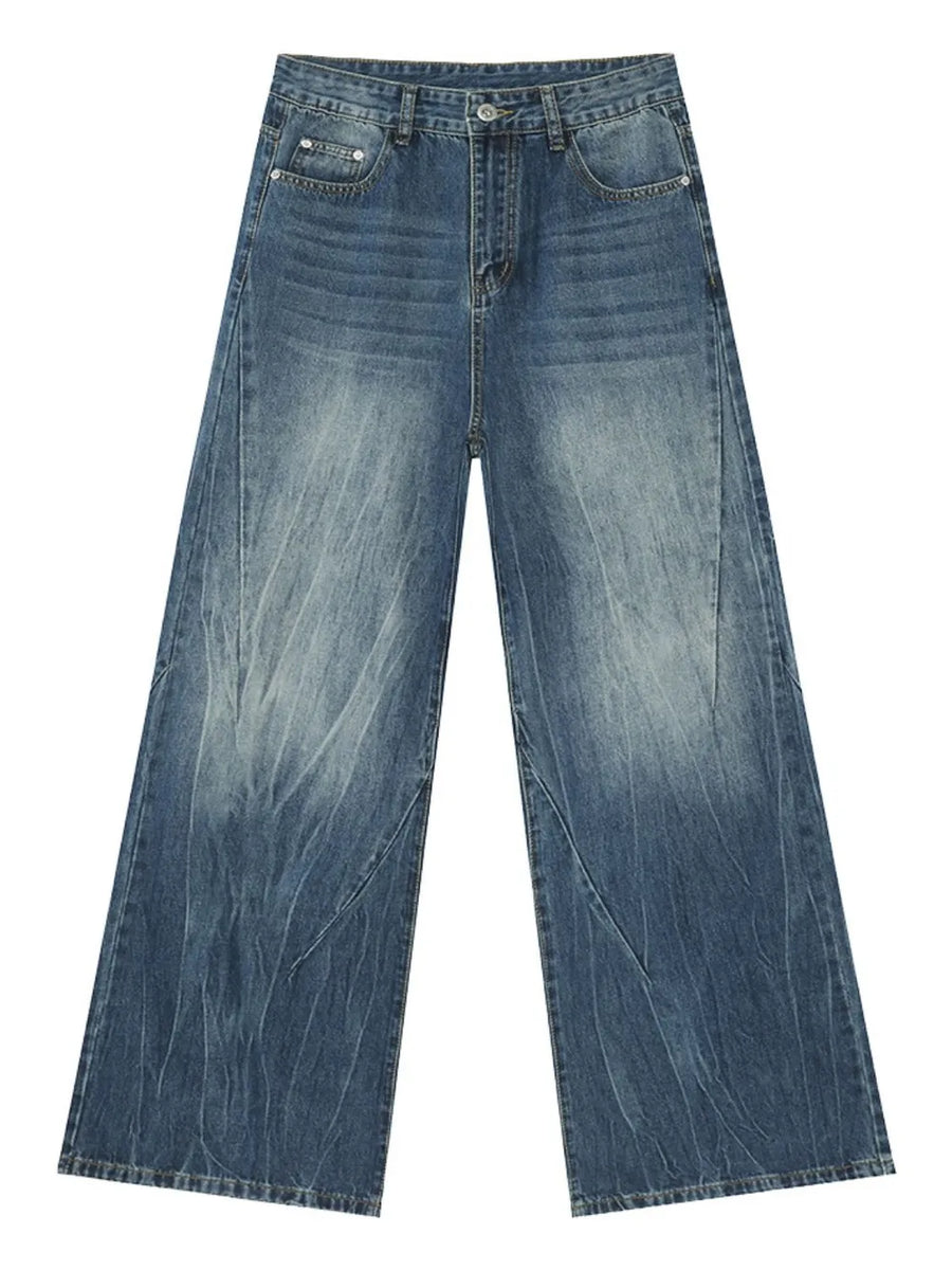 Electric Drift Wide Leg Jeans in Medium wash denim with distressed detailing and a relaxed fit.