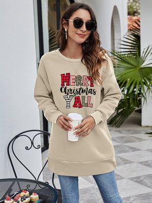 Beige oversized sweatshirt with Merry Christmas Y'all graphic in plaid and animal print.