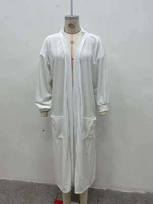 White cardigan featuring pocketed and abstract-print
