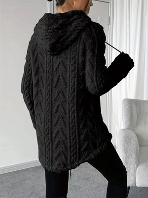 Black textured drawstring fleece hoodie with cable knit pattern and hood.