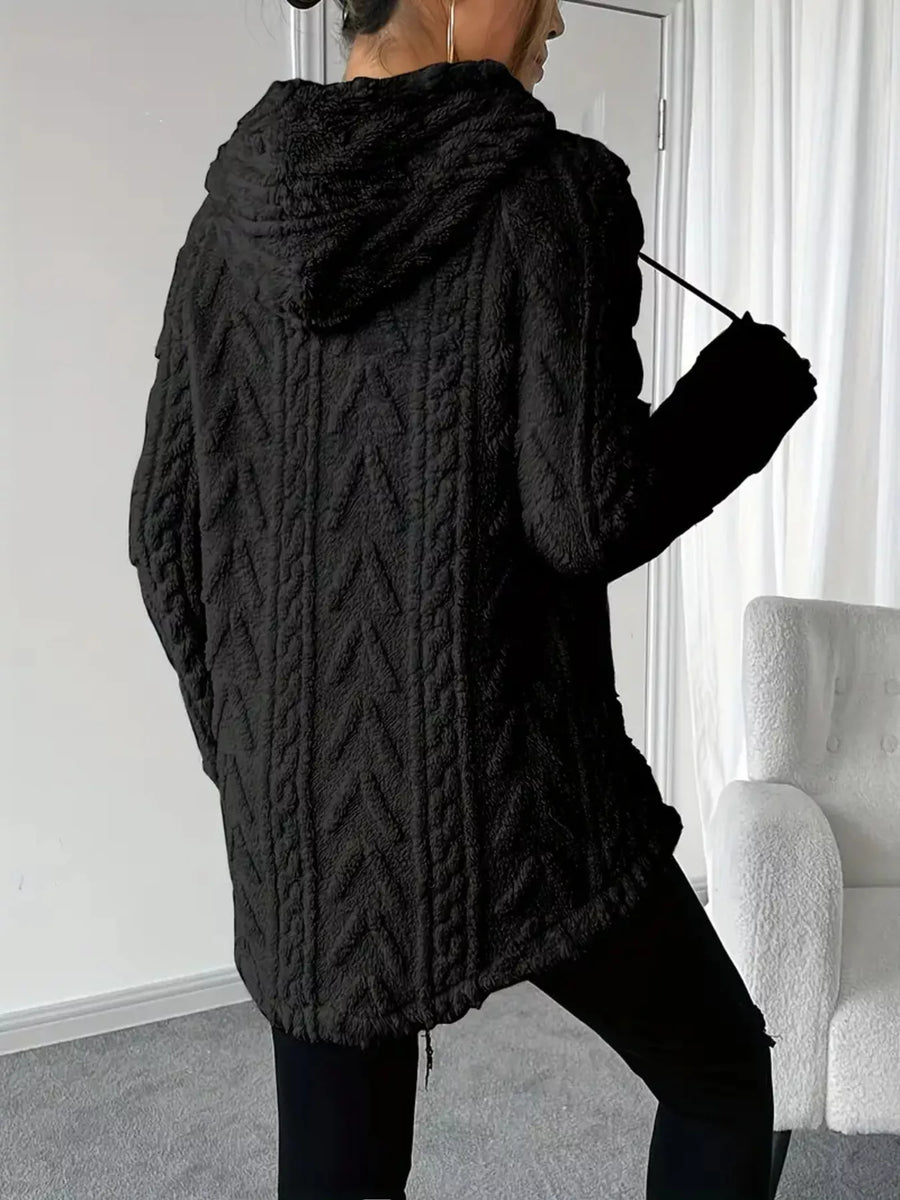 Black textured drawstring fleece hoodie with cable knit pattern and hood.