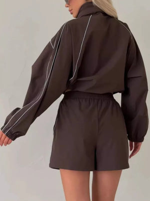 Brown track jacket with drawstring waist and long sleeve