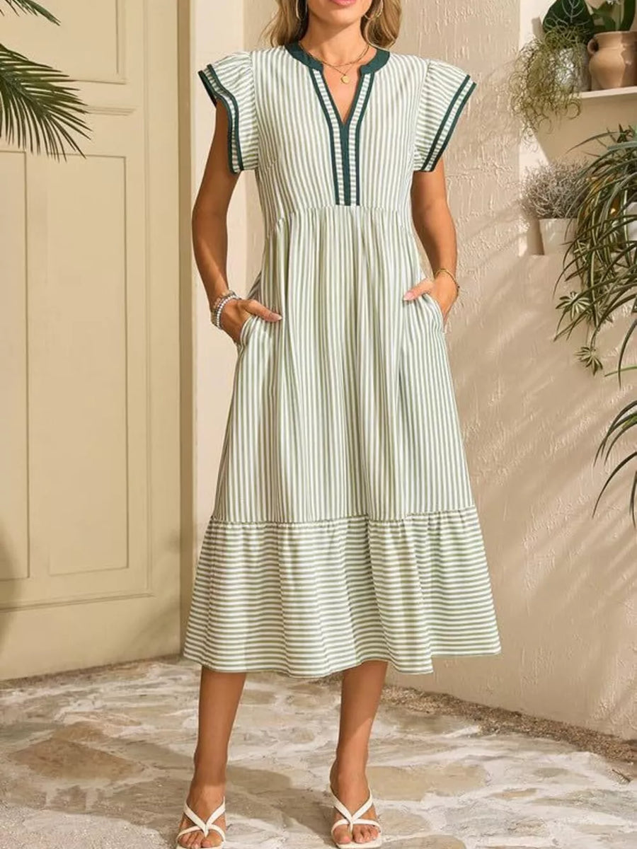 Green striped midi dress with notched V-neck, ruffle sleeves, and tiered hem.