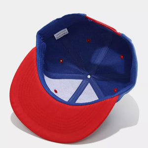 royal blue cap with N/A and snap