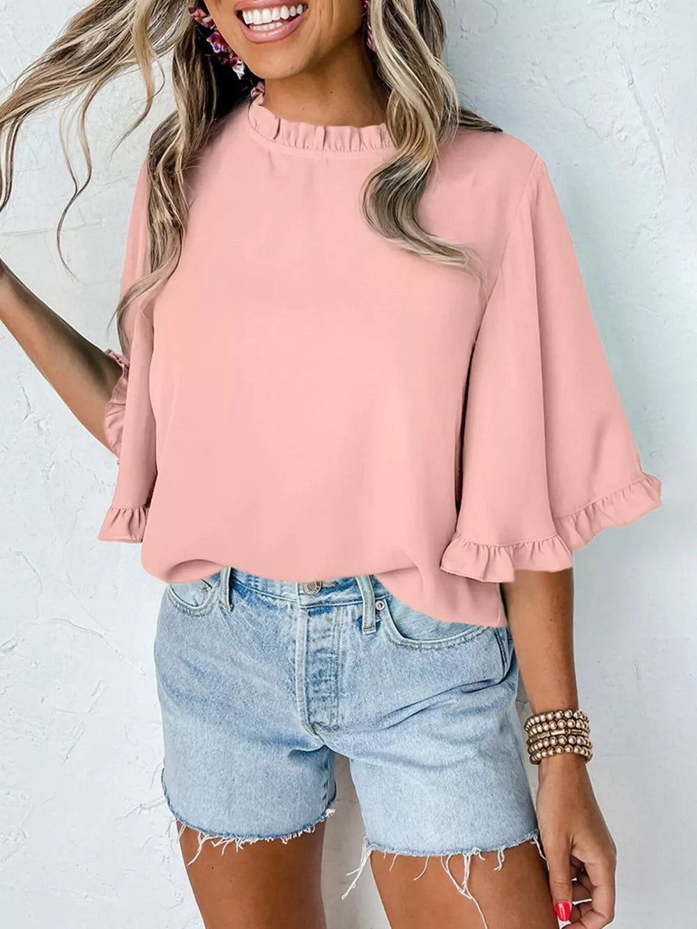 Pink ruffled mock neck half sleeve shirt with flared sleeves