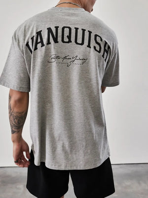 Gray oversized graphic tee with "Vanquish" back print and script text detail.
