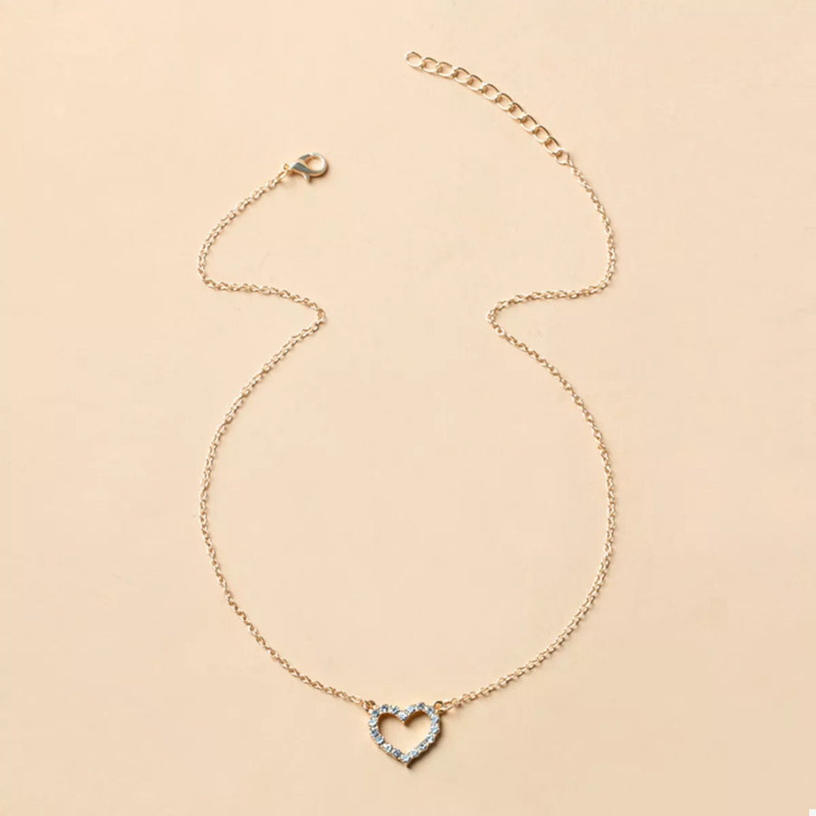 Gold dainty heart pendant necklace with clear stones, 18K gold-plated.