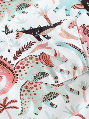 Toddler cotton shirt with a playful dinosaur print in pastel colors and a chest pocket.