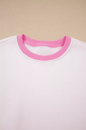White cotton sweatshirt with pink ribbed crew neck detail