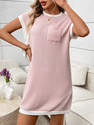 Pink ribbed knit mini dress with white trim and pocket detail.