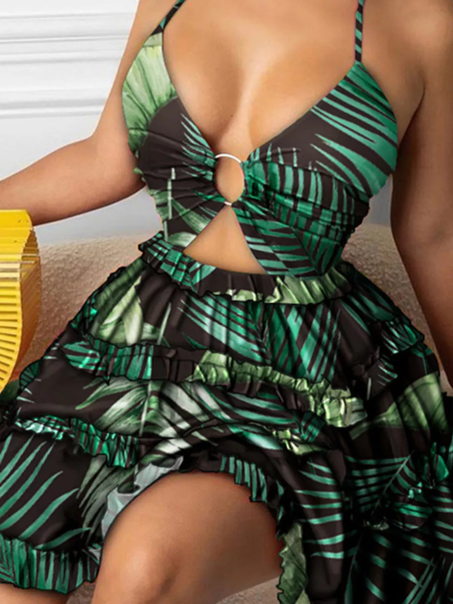 Halter mini dress with cutout and ring detail in a tropical leaf print.