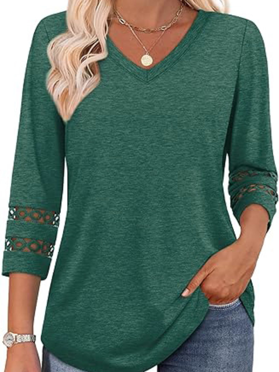 Dark green 3/4 sleeve t-shirt with V-neck and cutout detail on sleeves.