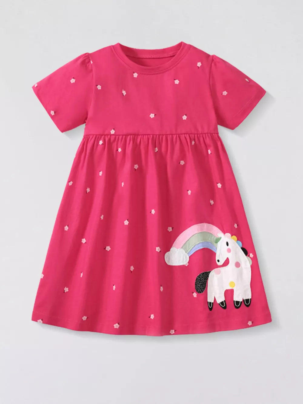 Girls pink short sleeve dress with allover floral print and unicorn rainbow applique.
