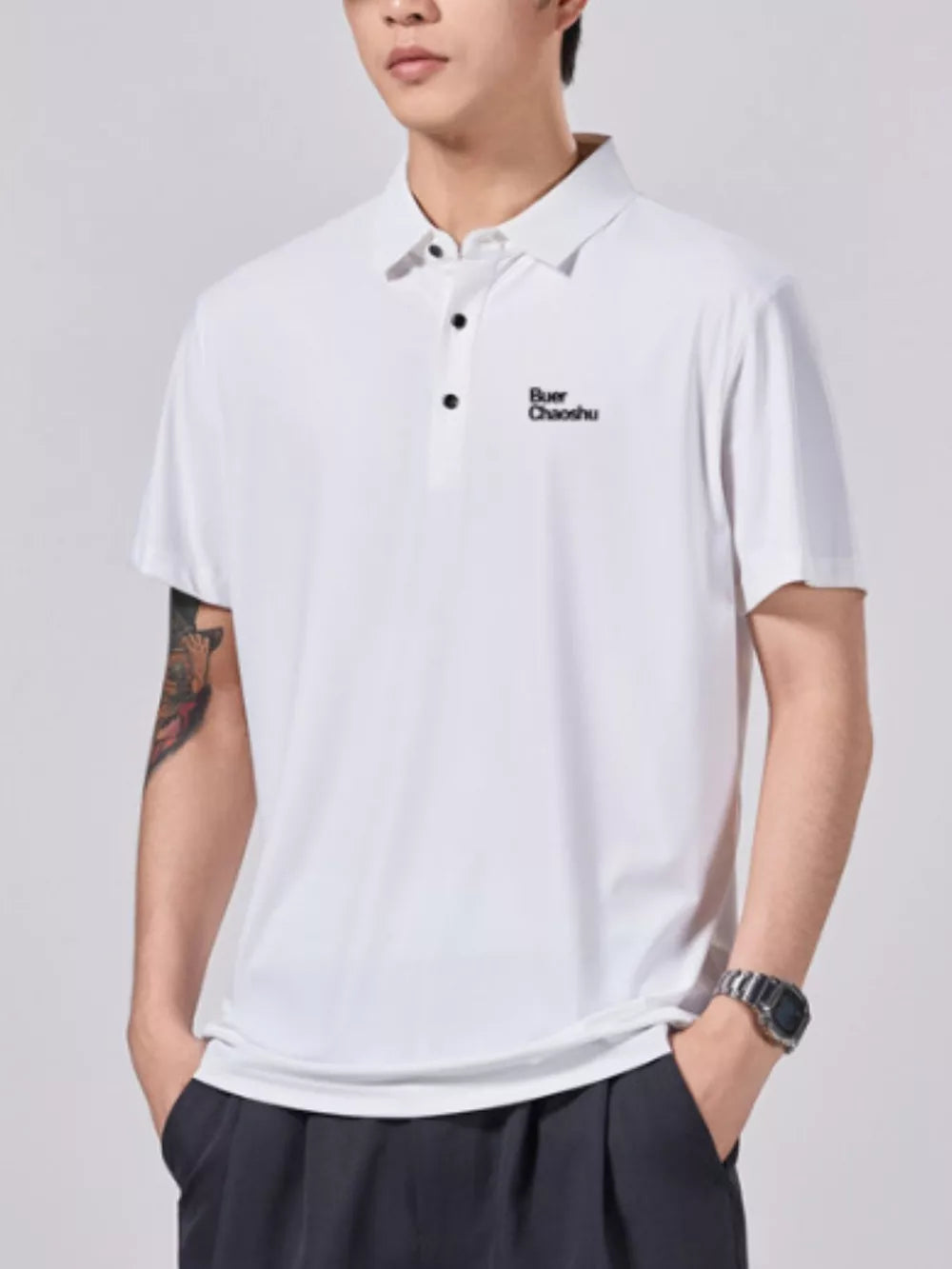 White short-sleeve cotton polo shirt with button detail and embroidered logo