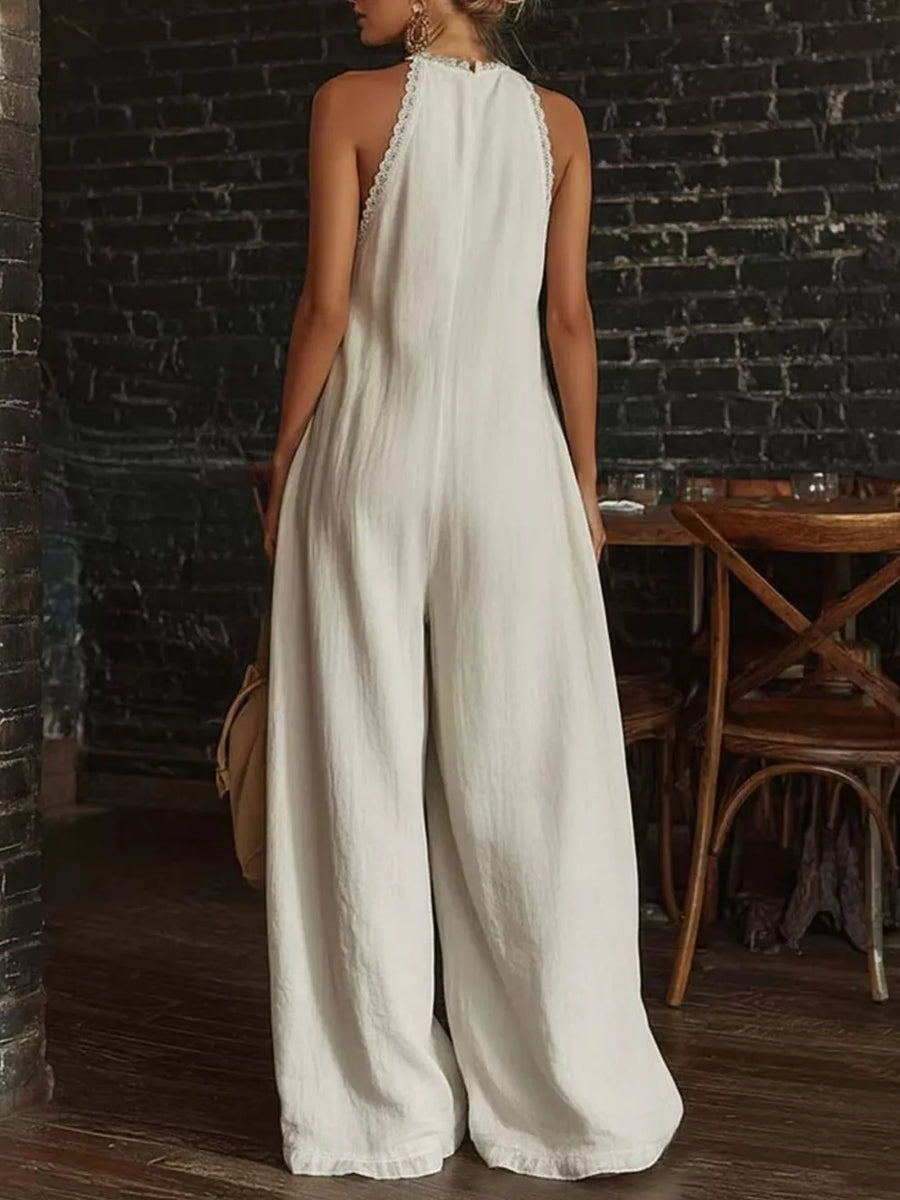 100% polyester Care instructions: Machine wash cold jumpsuit in Black with loose silhouette