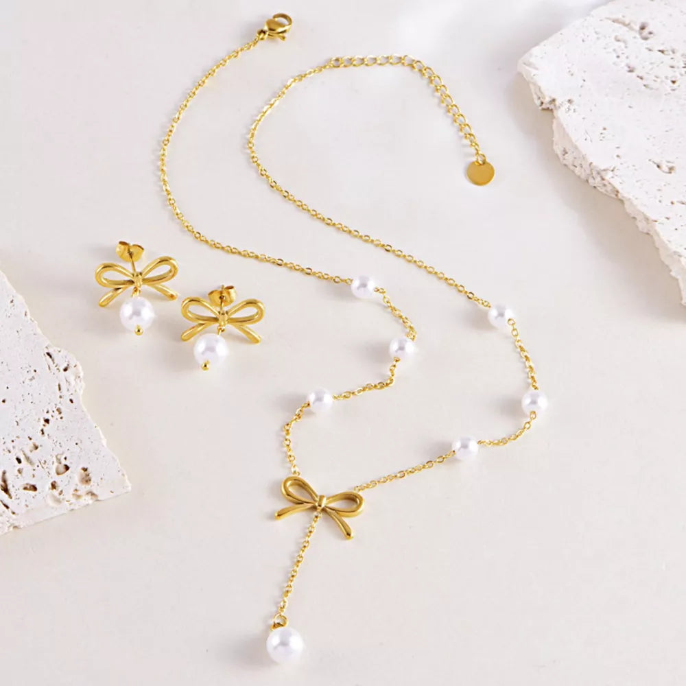 Jewelry Set in gold featuring bowknot charm and N/A fit