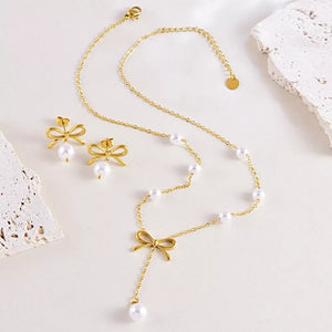 Jewelry Set in gold featuring bowknot charm and N/A fit